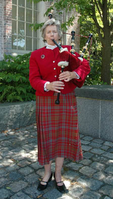 Nancy Tunnicliffe playing the Great Highland bagpipe.