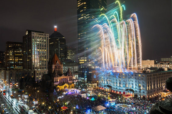 Fireworks going off over Copley Square in Boston at First Night. 